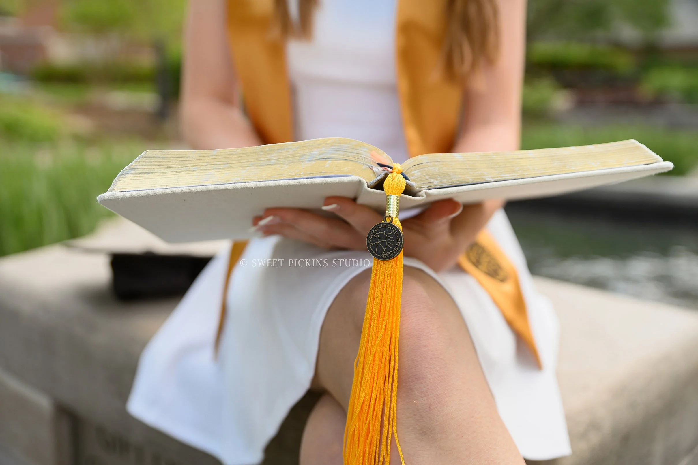 Katelyn’s Purdue University College Senior Photography with Bible and Tassel in West Lafayette, Indiana by Sweet Pickins Studio photographer Amanda Wilson ©