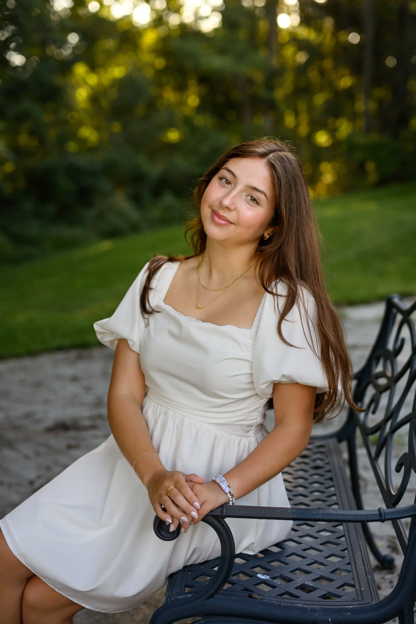 Maisie | Lakeville, Indiana Senior Portrait Photography for Madison East High School class of 2027 senior girl posing in white dress on bench by Peru Indiana senior photographer Amanda Wilson © Sweet Pickins Studio