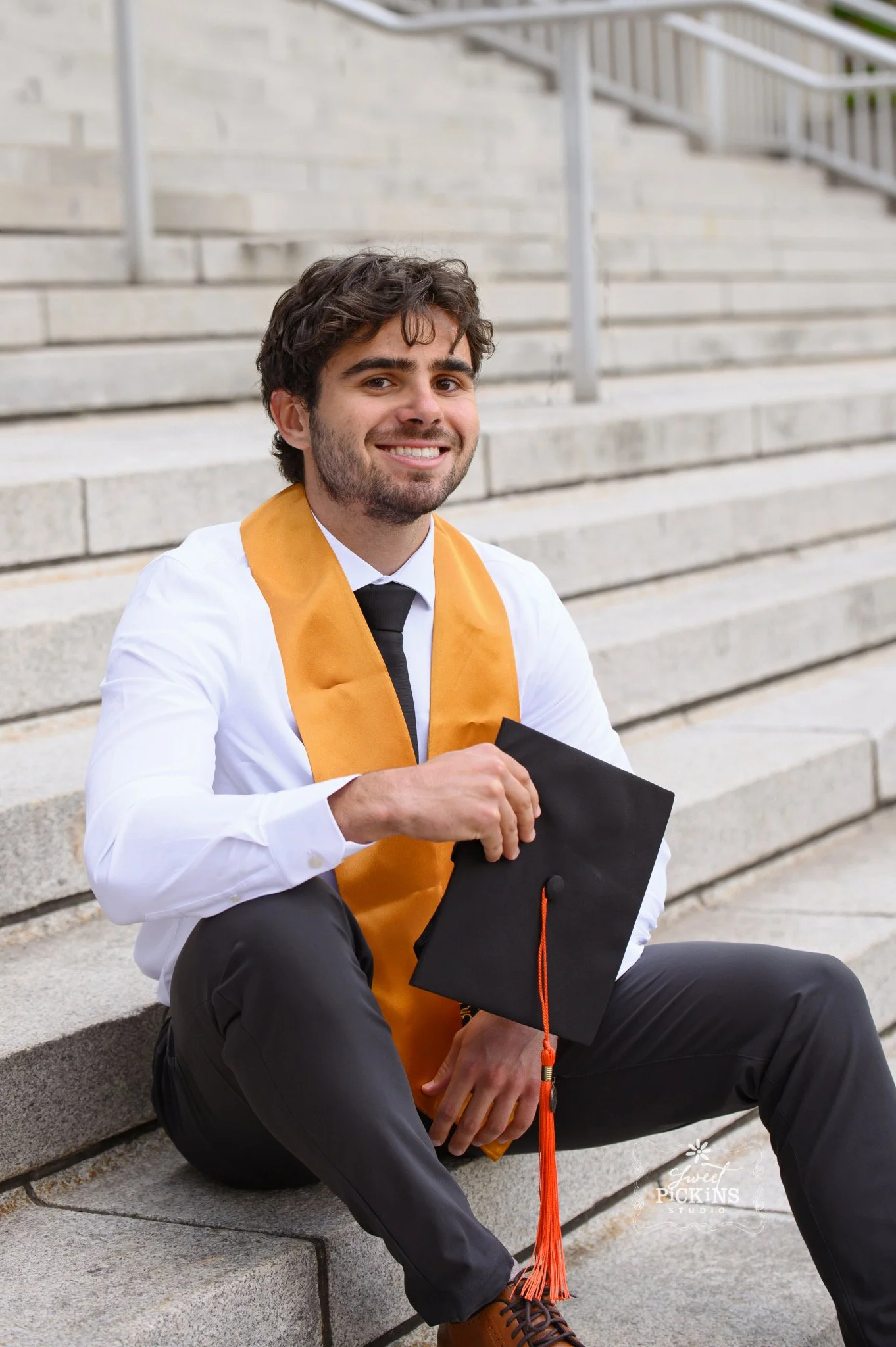 Purdue University Graduation Photography for Guys  in Cap and Gown on college campus by Sweet Pickins Studio senior photographer Amanda Wilson ©