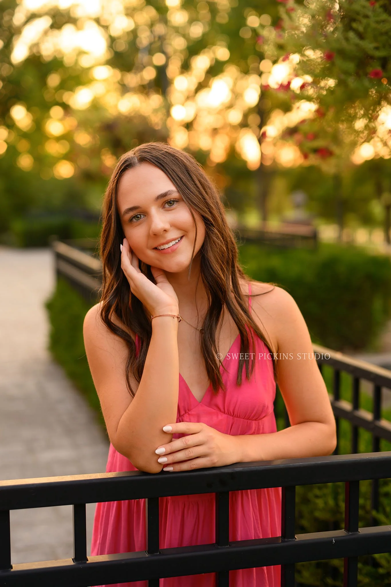 Sophie’s Carmel, Indiana Senior Photography by Sweet Pickins Studio senior photographer Amanda Wilson for class of 2027 Senior girl posing in pink maxi dress at sunset ©