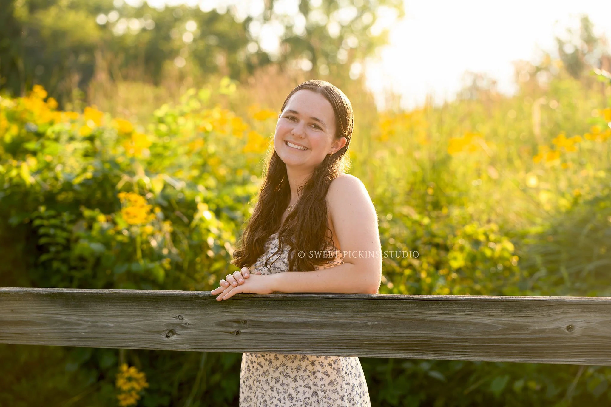 Carmel, Indiana Senior Photography for Class of 2027 Senior Ellen in Flower Field wearing floral dress by Sweet Pickins Studio senior photographer Amanda Wilson ©