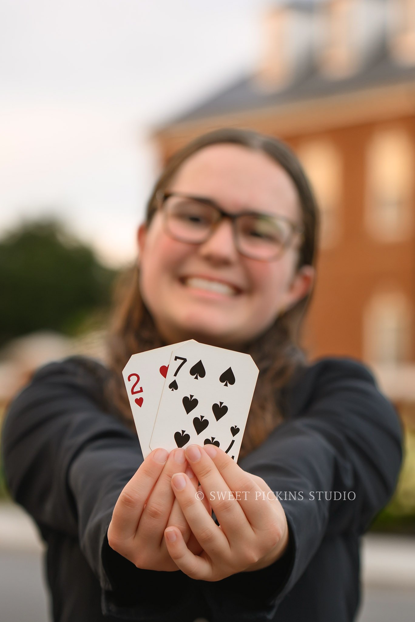 Downtown Carmel, Indiana Senior Photography for Class of 2027 Senior Ellen at City Hall wearing business suit in summer by Sweet Pickins Studio senior photographer Amanda Wilson ©