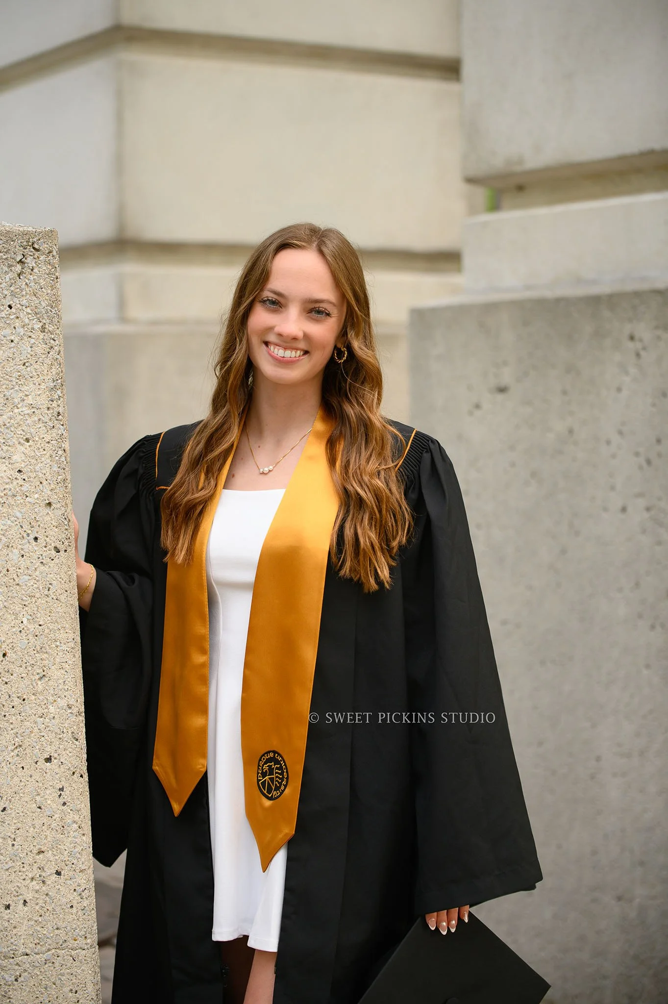 Katelyn’s Purdue University Graduation Photography in Cap and Gown at Bell Tower in West Lafayette, Indiana by Sweet Pickins Studio photographer Amanda Wilson ©