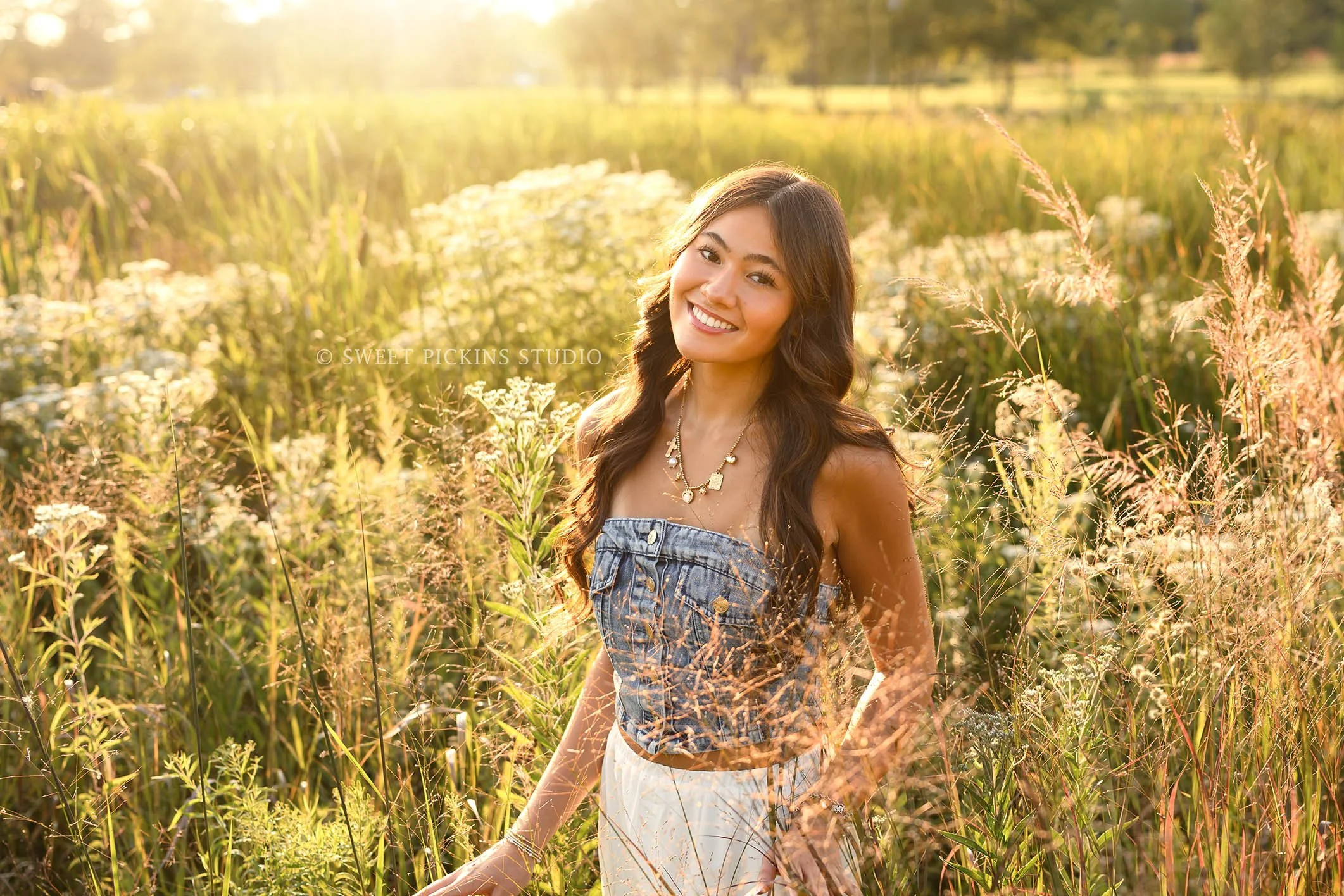 Rachel | Carmel, Indiana Senior Pictures in Golden Field for Class of 2027 senior girl posing in denim crop top and white skirt by Sweet Pickins Studio senior photographer Amanda Wilson ©