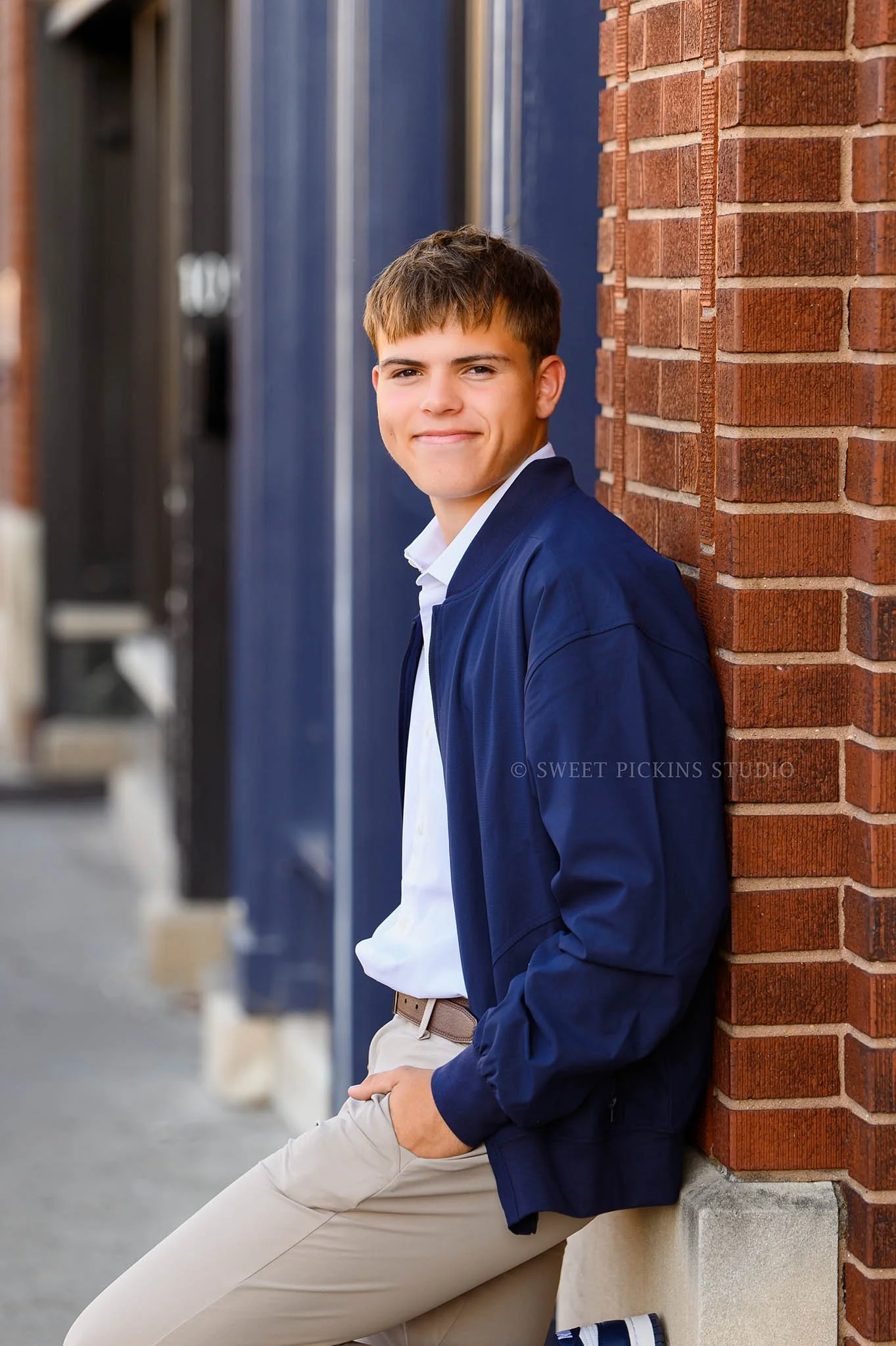Kokomo, Indiana Senior Guy Photography in Urban Downtown for Class of 2026 Peru High School senior XANDER by Sweet Pickins Studio senior photographer Amanda Wilson ©