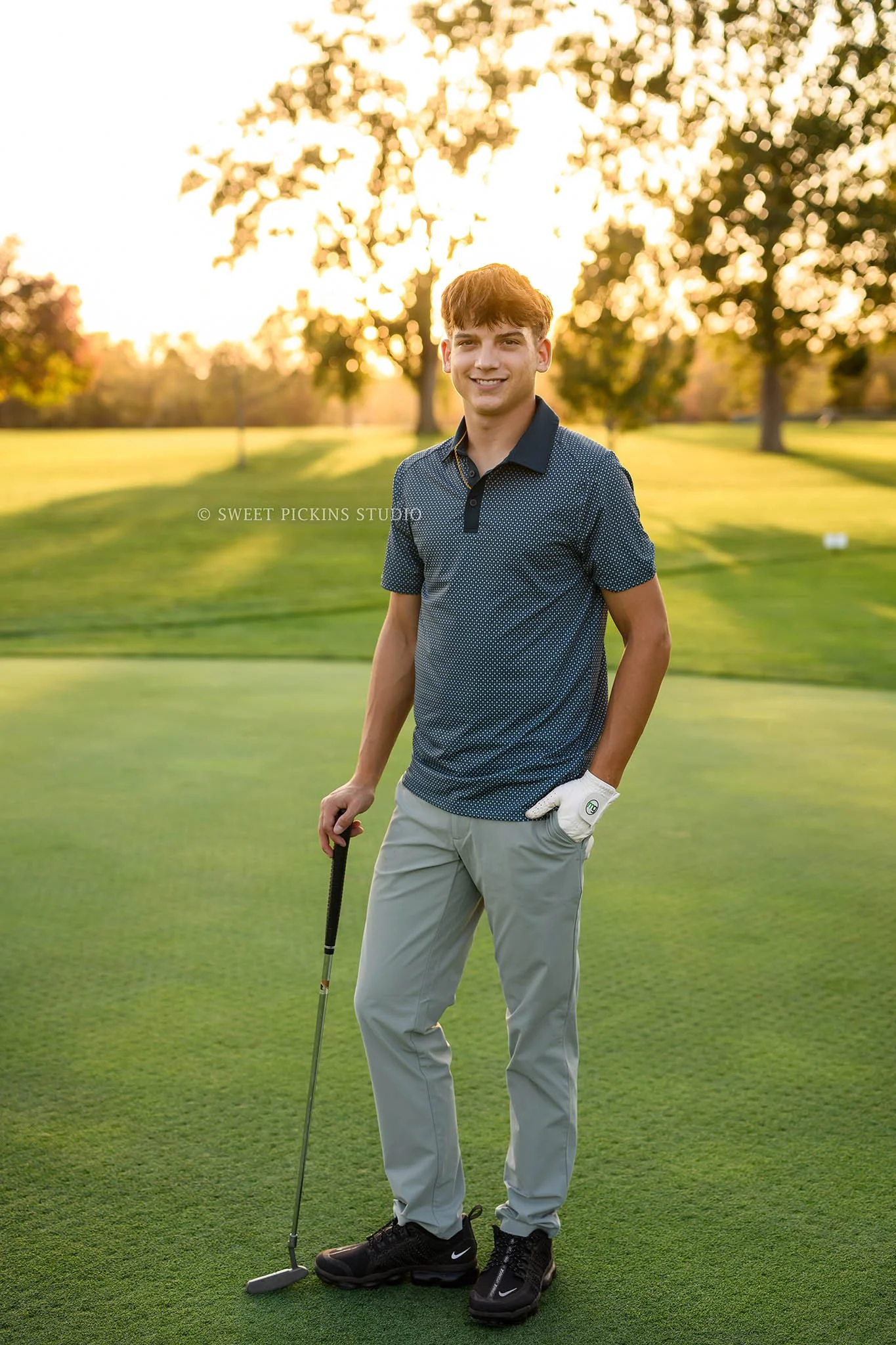 Cohen | Peru, Indiana Golf Senior Photography in Fall for Maconaquah High School Class of 2027 senior guy posing on golf course with driver by Sweet Pickins Studio senior photographer Amanda Wilson ©