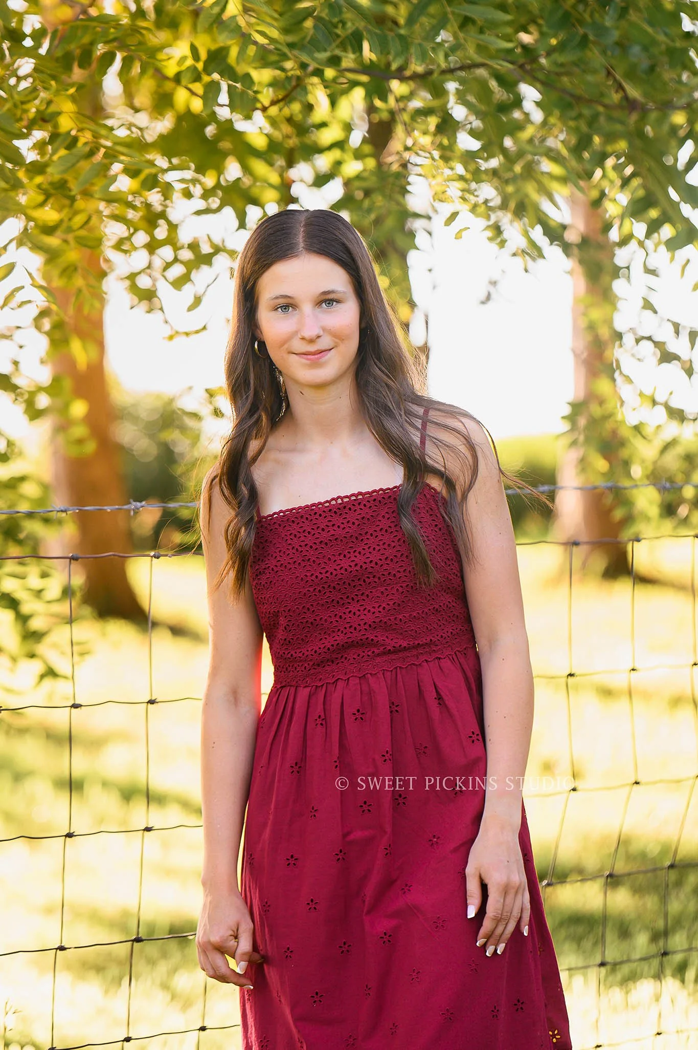 Denver, Indiana Senior Photography wearing Red Sun Dress in Pasture Field at Sunset by Sweet Pickins Studio Photographer Amanda Wilson ©