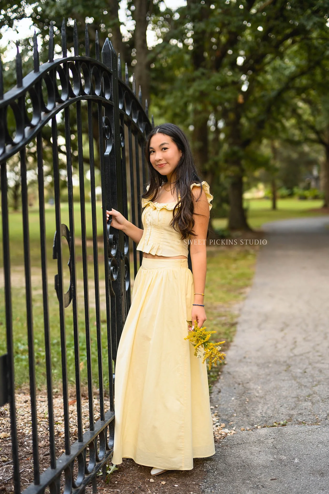Nora | Carmel, Indiana Fall Senior Girl Photography with yellow bouquet of flowers wearing yellow skirt set for Park Tudor Class of 2027 by Sweet Pickins Studio senior photographer Amanda Wilson ©