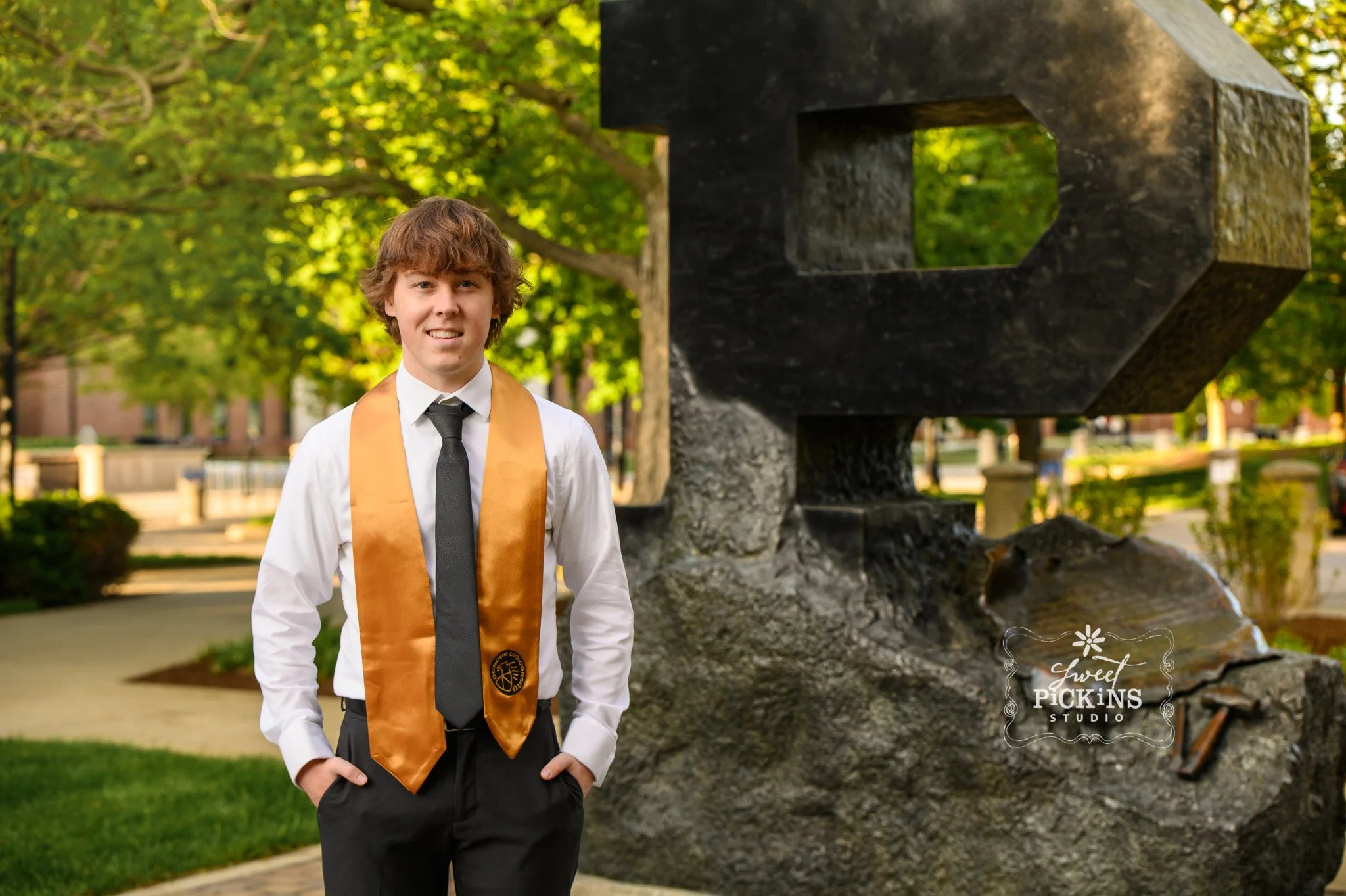 Purdue University Graduation Photography for Guy in Cap and Gown in West Lafayette by Sweet Pickins Studio senior photographer Amanda Wilson ©