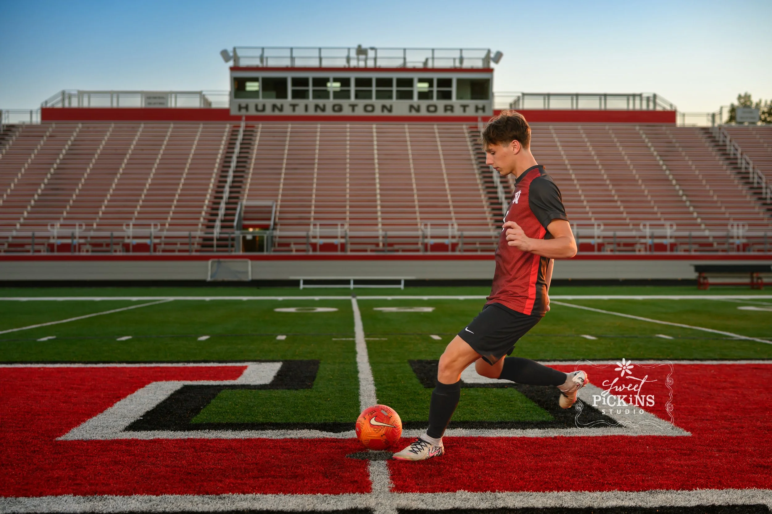 Huntington, Indiana Soccer Senior Photography for Huntington North Class of 2027 sports athlete BOSTAN at stadium by Sweet Pickins Studio senior photographer Amanda Wilson ©