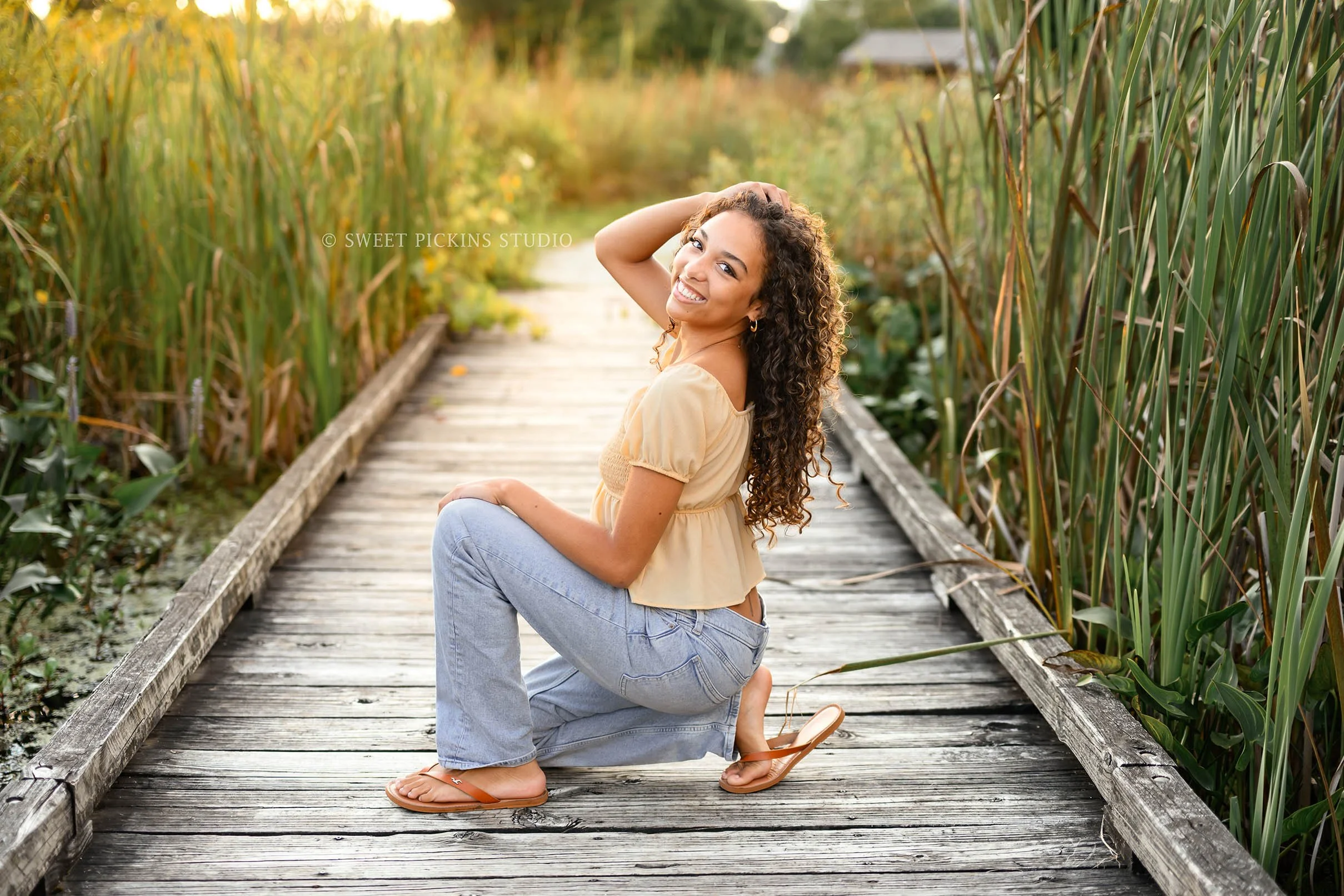 Madeline | Senior Girl Photography on Wood Boardwalk for Class of 2027 by Peru Indiana Senior  photographer Amanda Wilson of Sweet Pickins Studio ©