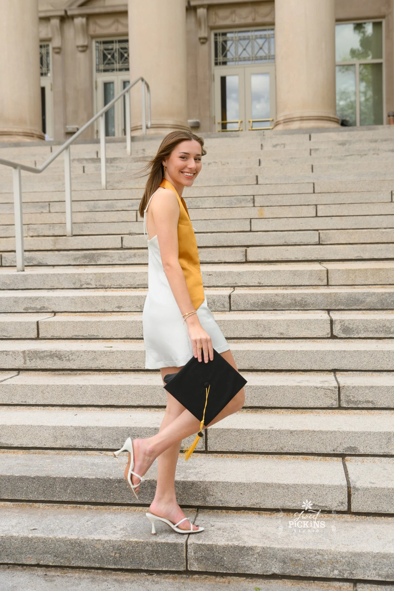 Purdue University Graduation Photography for Twins Class of 2026 Sisters pose at Hovde Hall steps in West Lafayette, Indiana by Sweet Pickins Studio senior photographer Amanda Wilson ©