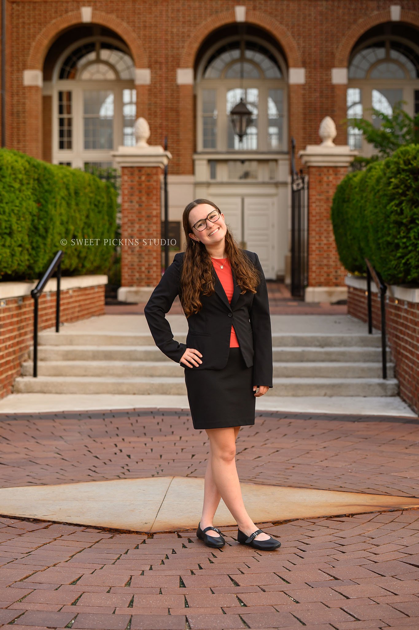 Downtown Carmel, Indiana Senior Photography for Class of 2027 Senior Ellen at City Hall wearing business suit in summer by Sweet Pickins Studio senior photographer Amanda Wilson ©