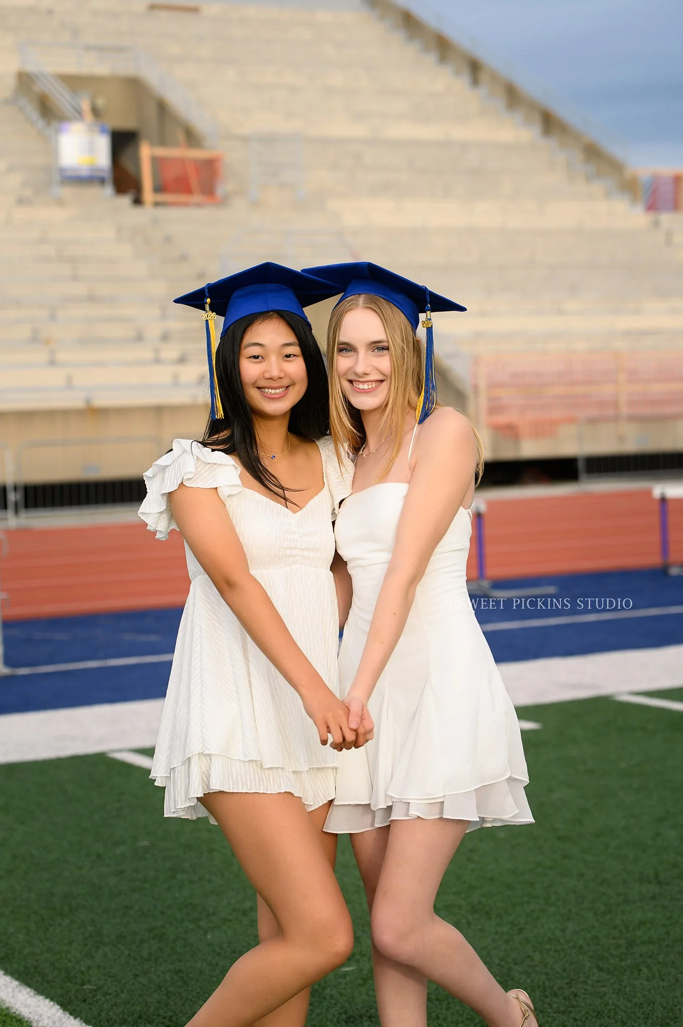Holly and Taylor’s Carmel High School Graduation Photography in Cap and Gown for best friends by Sweet Pickins Studio senior photographer Amanda Wilson ©