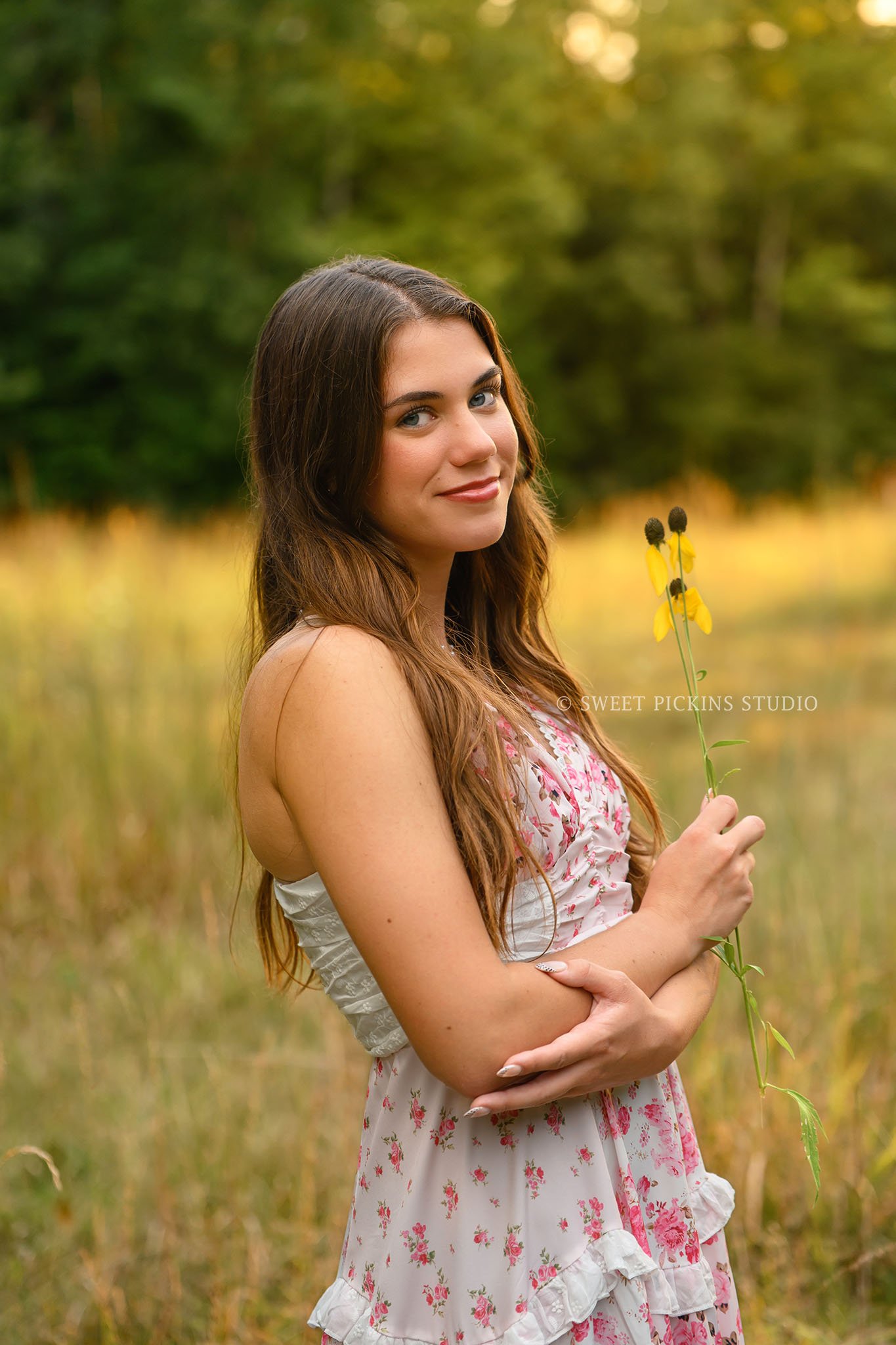 Taylor | Indiana Senior Girl Photography for class of 2027 senior posing with flower wearing pink floral maxi dress by Sweet Pickins Studio senior photographer Amanda Wilson ©