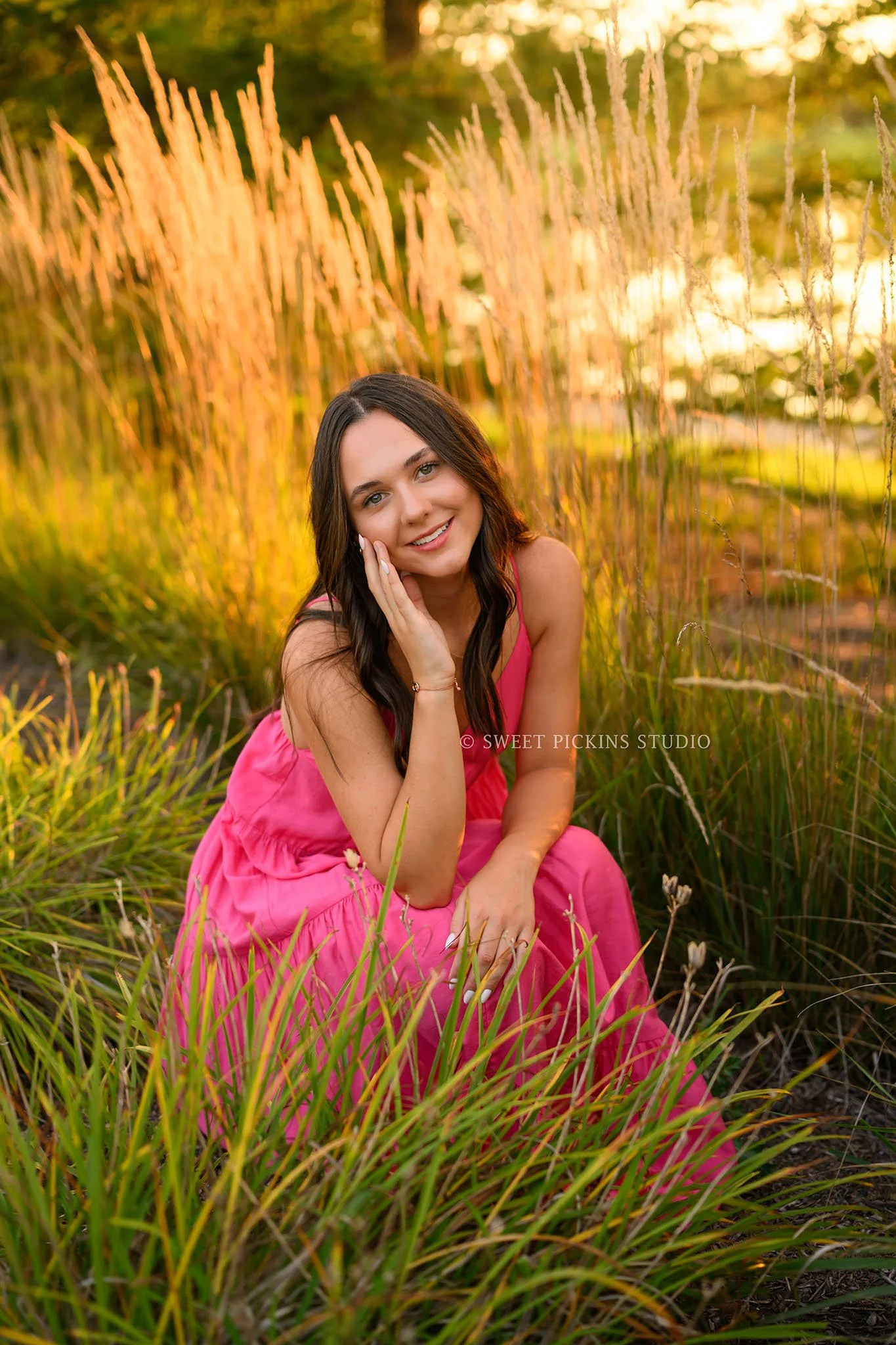 Sophie’s Carmel, Indiana Senior Photography by Sweet Pickins Studio senior photographer Amanda Wilson for class of 2027 Senior girl posing in pink maxi dress in golden grass ©