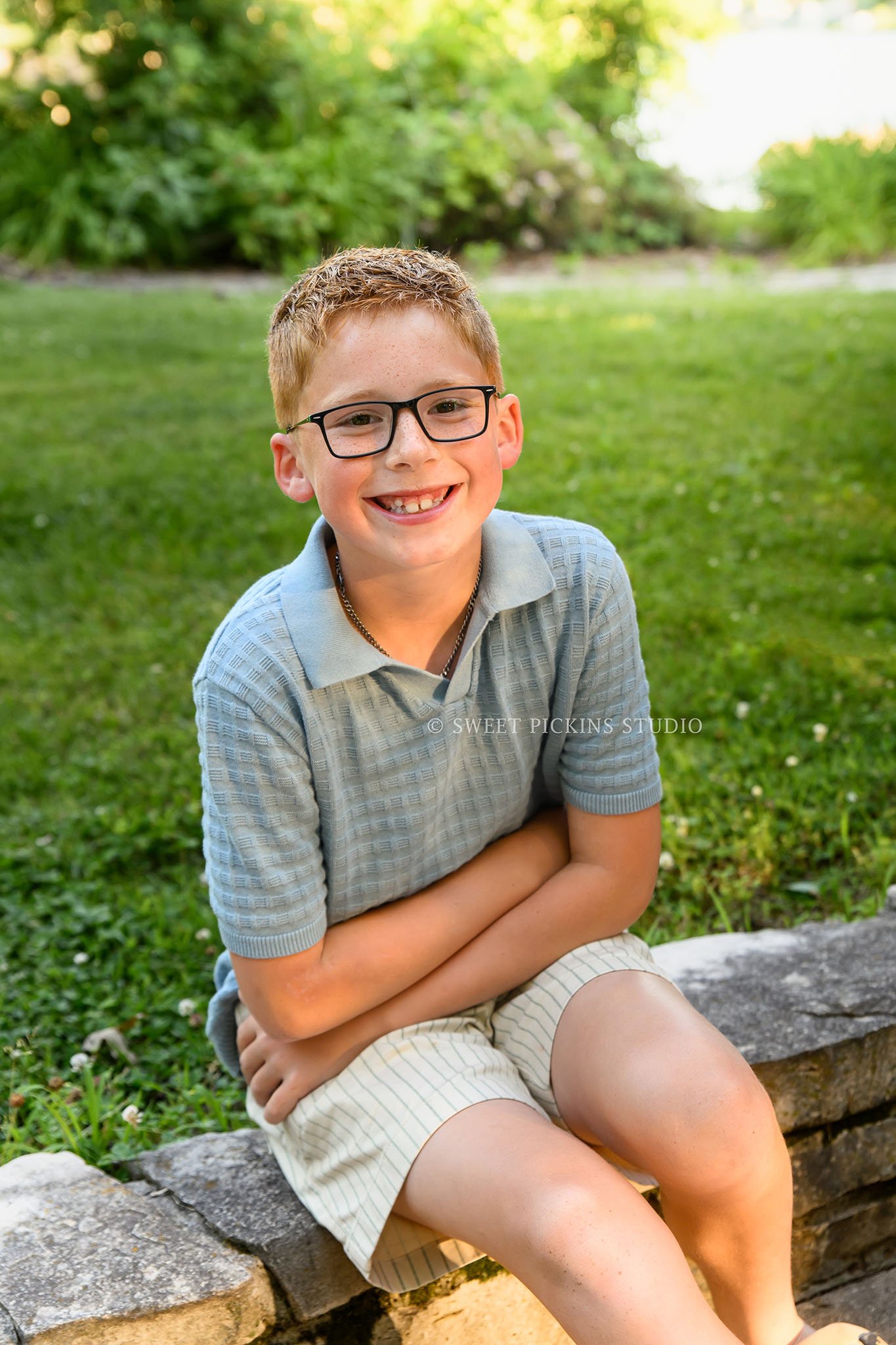 Roann, Indiana Family Portrait Photography of boy wearing blue and beige outfits at Luken’s Lake outdoor nature location in summer by Sweet Pickins Studio family photographer Amanda Wilson ©