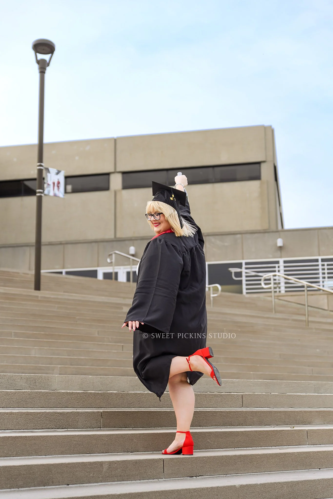 Sydney |  IU Indy Graduation Photography in Cap and Gown in Downtown Indianapolis, Indiana in Spring by Sweet Pickins Studio senior photographer Amanda Wilson ©