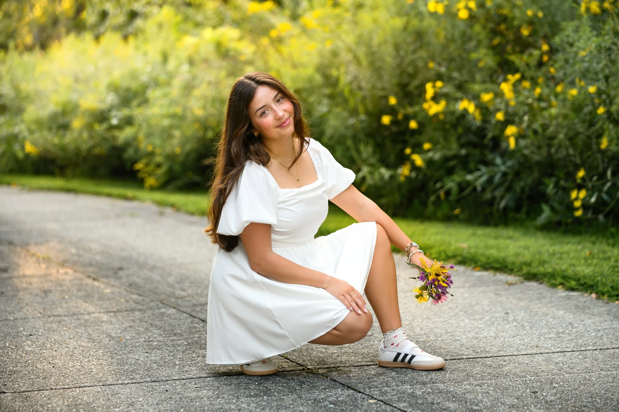 Maisie | Lakeville, Indiana Senior Girl Portraits for Madison East High School class of 2027 senior posing in white dress with flower bouquet by Peru Indiana senior photographer Amanda Wilson © Sweet Pickins Studio