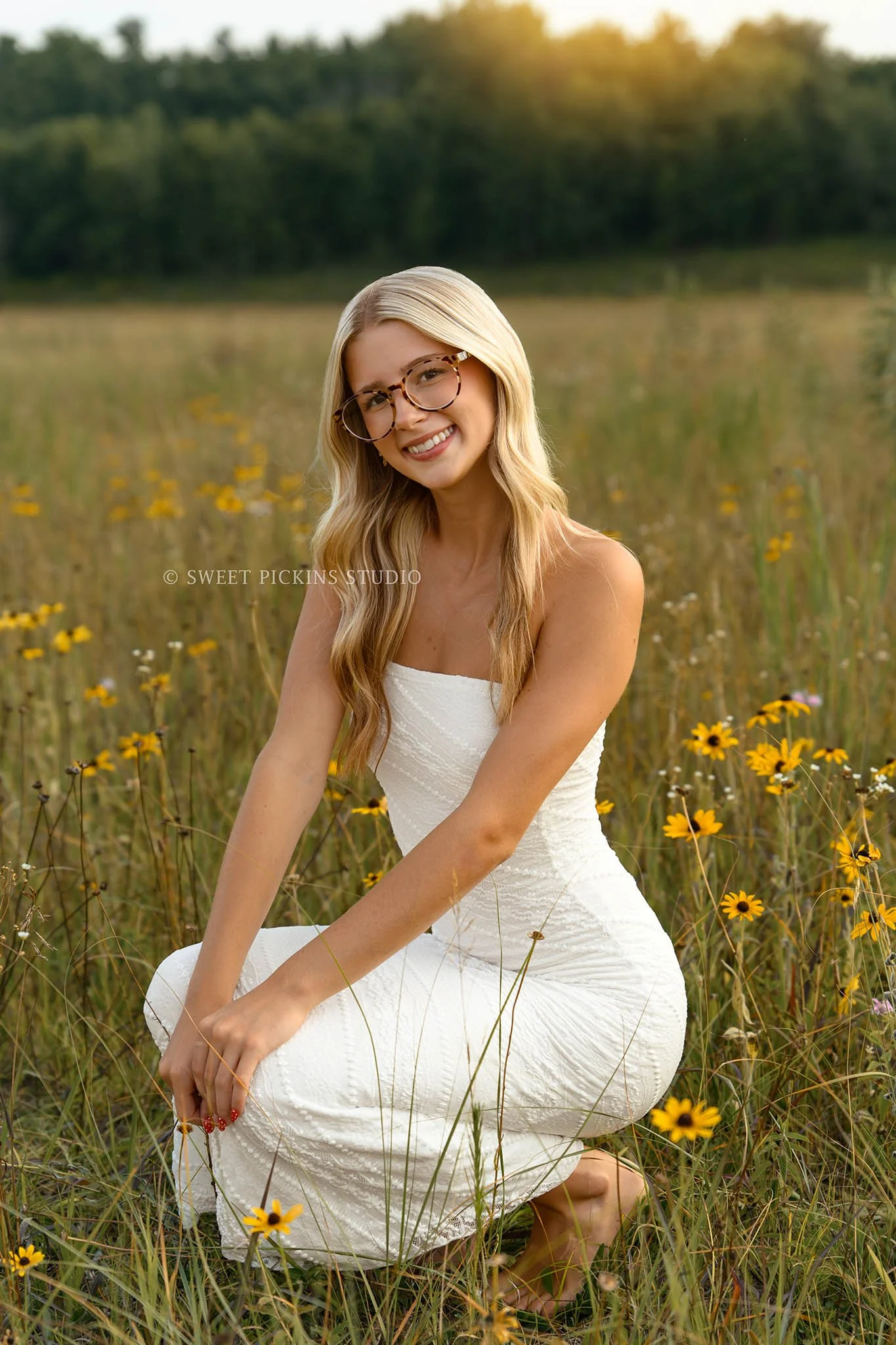 Indiana Flower Field Senior Photography for Logansport Class of 2027 Kyree wearing white dress in golden hour by Sweet Pickins Studio senior photographer Amanda Wilson ©