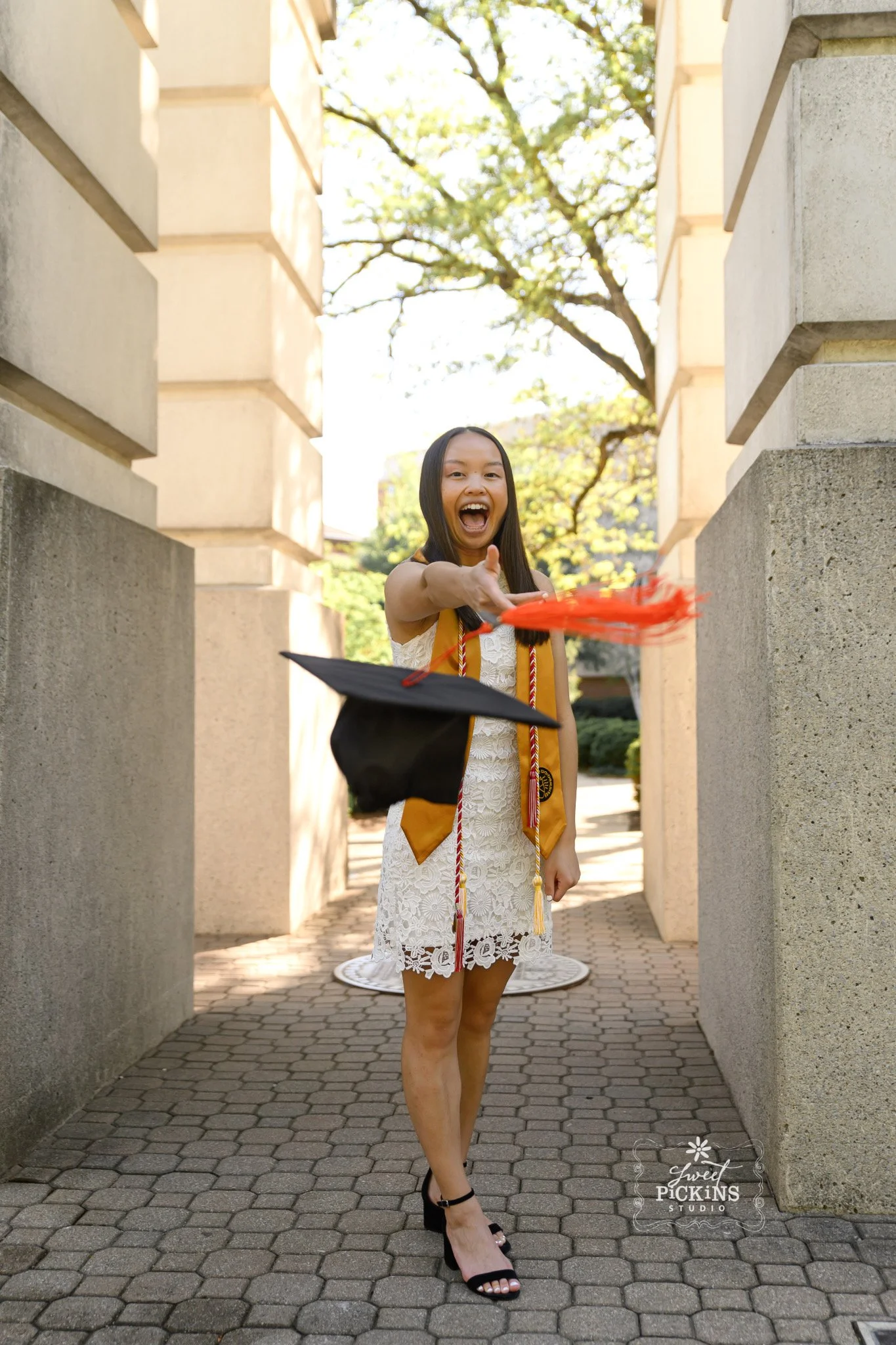 Ariane | Purdue Graduation Cap and Gown Photography in West Lafayette, Indiana for Civil Engineering Graduate in Spring by Sweet Pickins Studio senior photographer Amanda Wilson ©