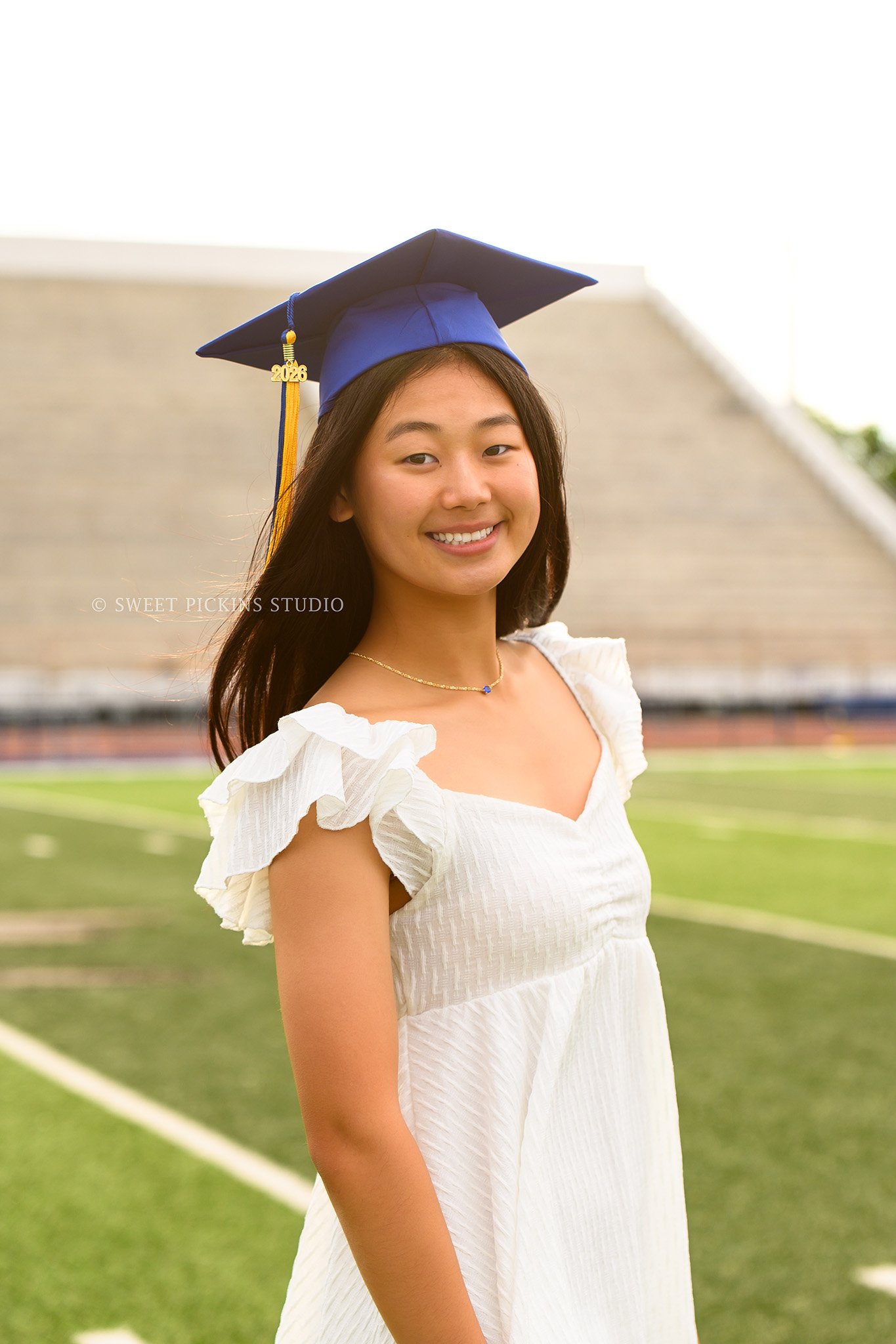 Carmel Indiana Graduation Photography in Cap and Gown by Sweet Pickins Studio senior photographer Amanda Wilson for class of 2026 high school girl ©