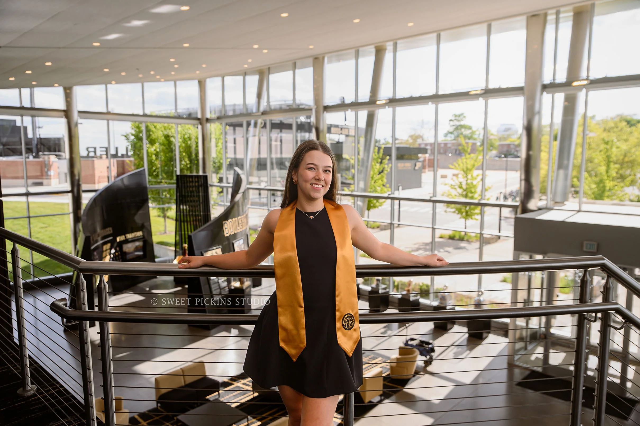 Ashelyn’s Purdue University Graduation Portrait Photography at Boilermaker Sports facility in West Lafayette, Indiana by Sweet Pickins Studio senior photographer Amanda Wilson © 2026
