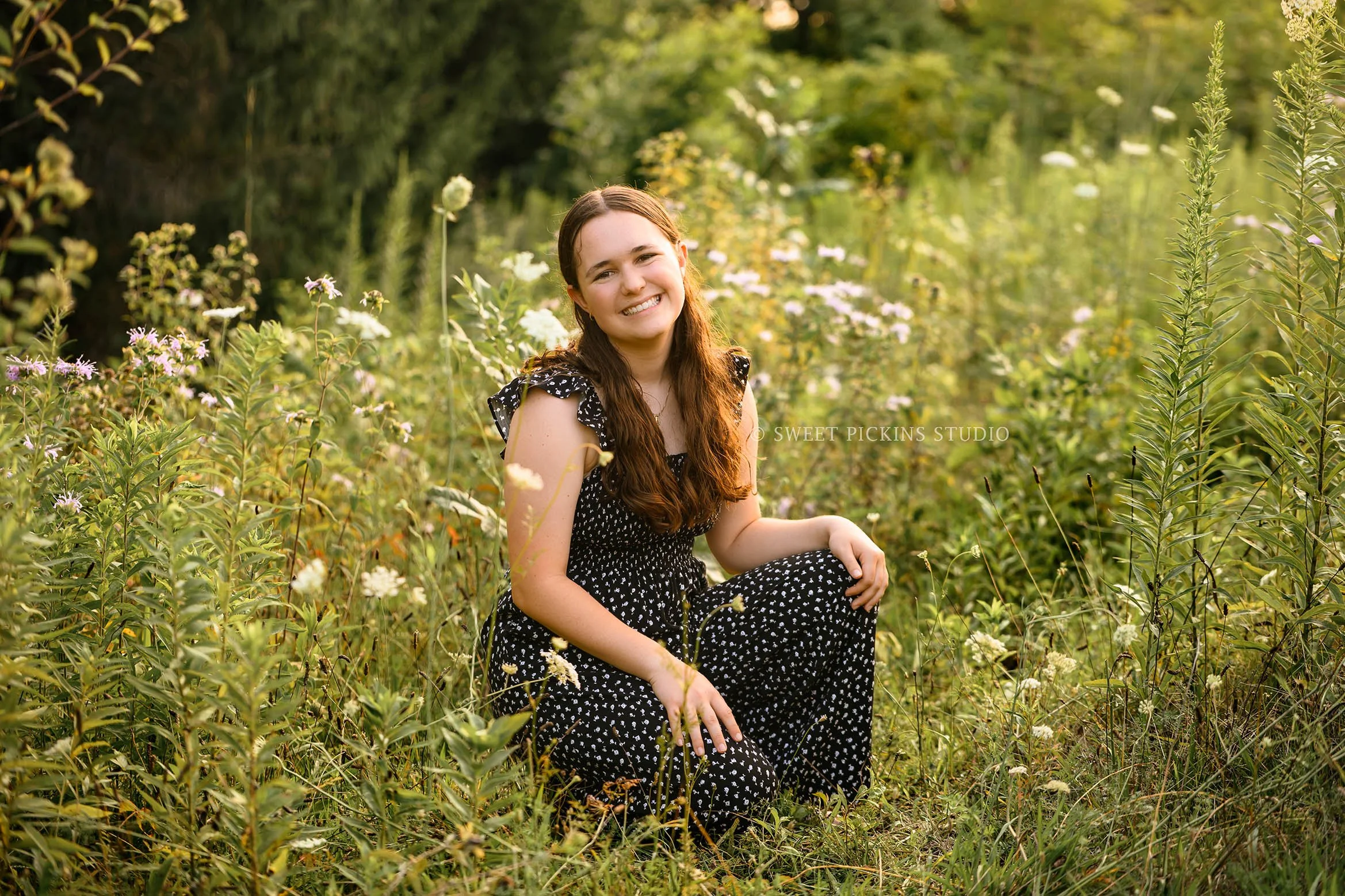 Carmel, Indiana Senior Photography for Class of 2027 Senior Ellen in Flower Field wearing floral romper in summer by Sweet Pickins Studio senior photographer Amanda Wilson ©