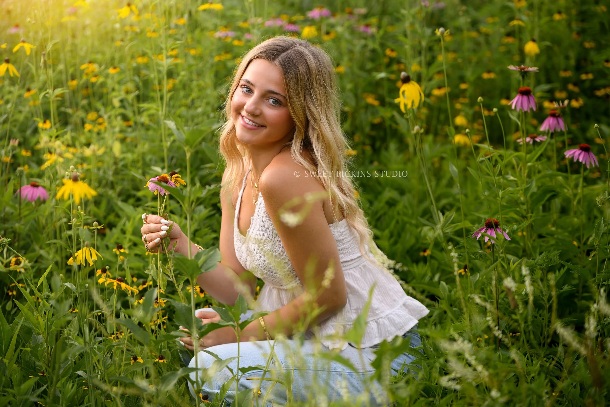 Addison’s Peru, Indiana Wildflower Senior Photography in Summer golden hour wearing white eyelet tank top and denim jeans  by Sweet Pickins Studio senior photographer Amanda Wilson  ©