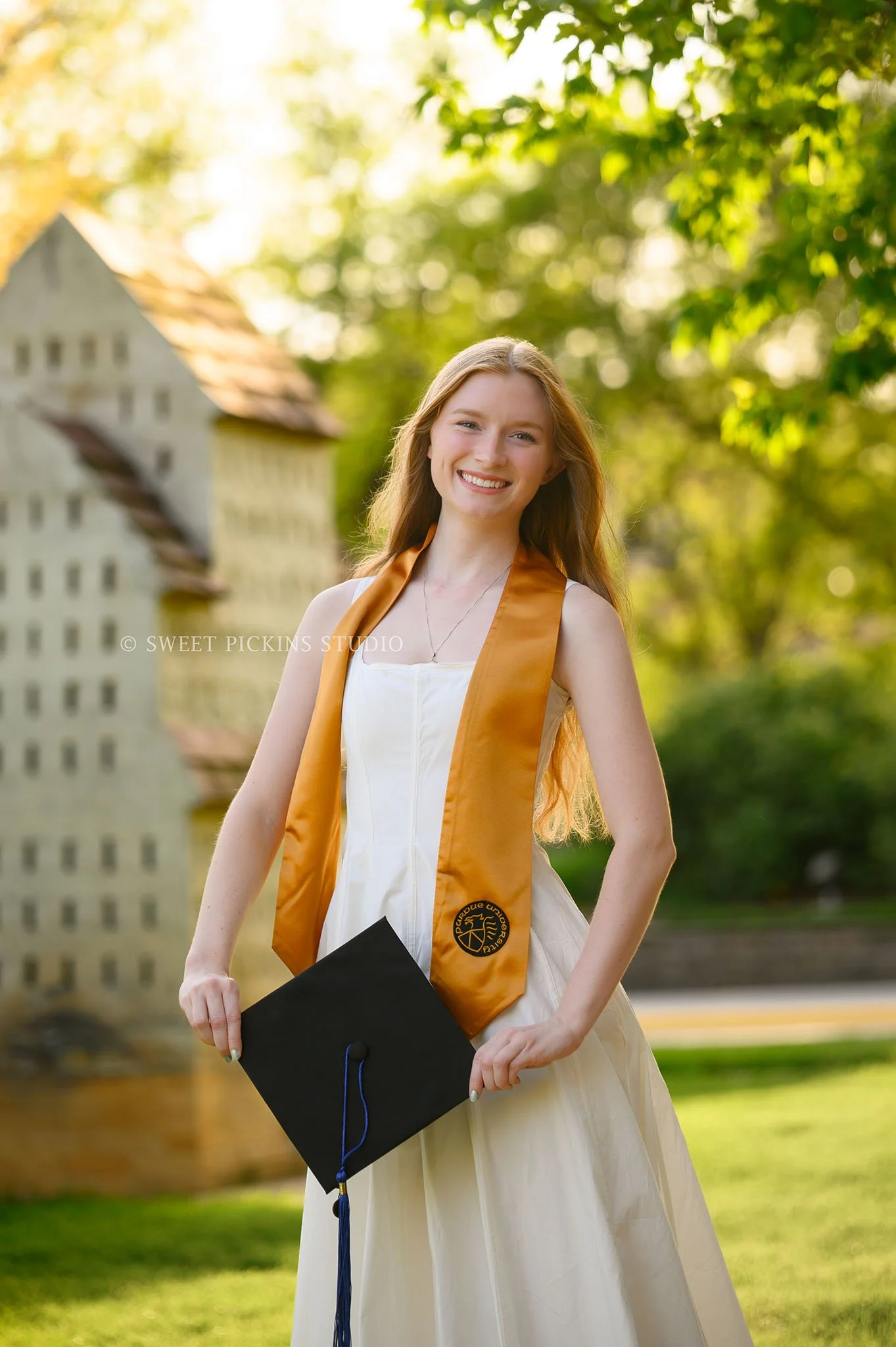 Maggie’s Purdue University Graduation Portraits in West Lafayette, Indiana at PAO Hall by Sweet Pickins Studio senior photographer Amanda Wilson ©