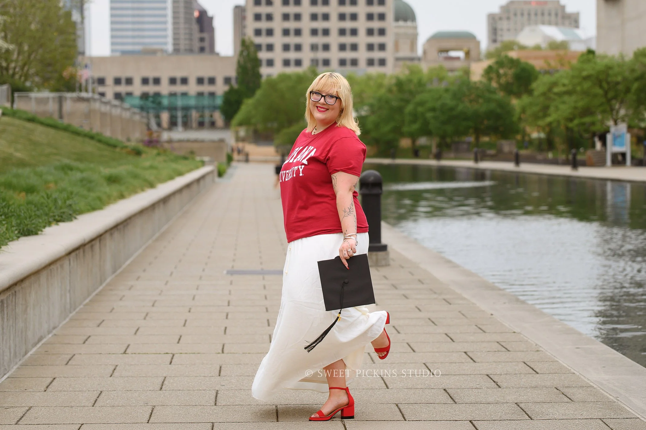 Sydney |  IU Indy Graduation Photography in Cap and Gown in Downtown Indianapolis, Indiana in Spring by Sweet Pickins Studio senior photographer Amanda Wilson ©