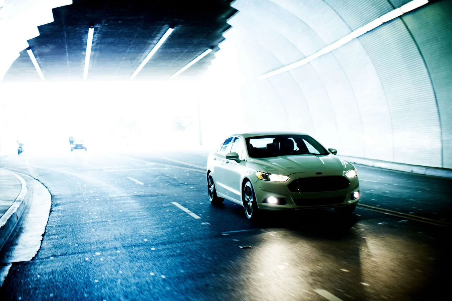 51f6861106bd8_Christian_Kozowyk_car_in_lit_tunnel.jpg
