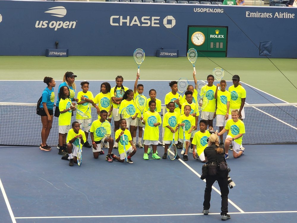 Group Photo On Court after Tennis Demo.jpg