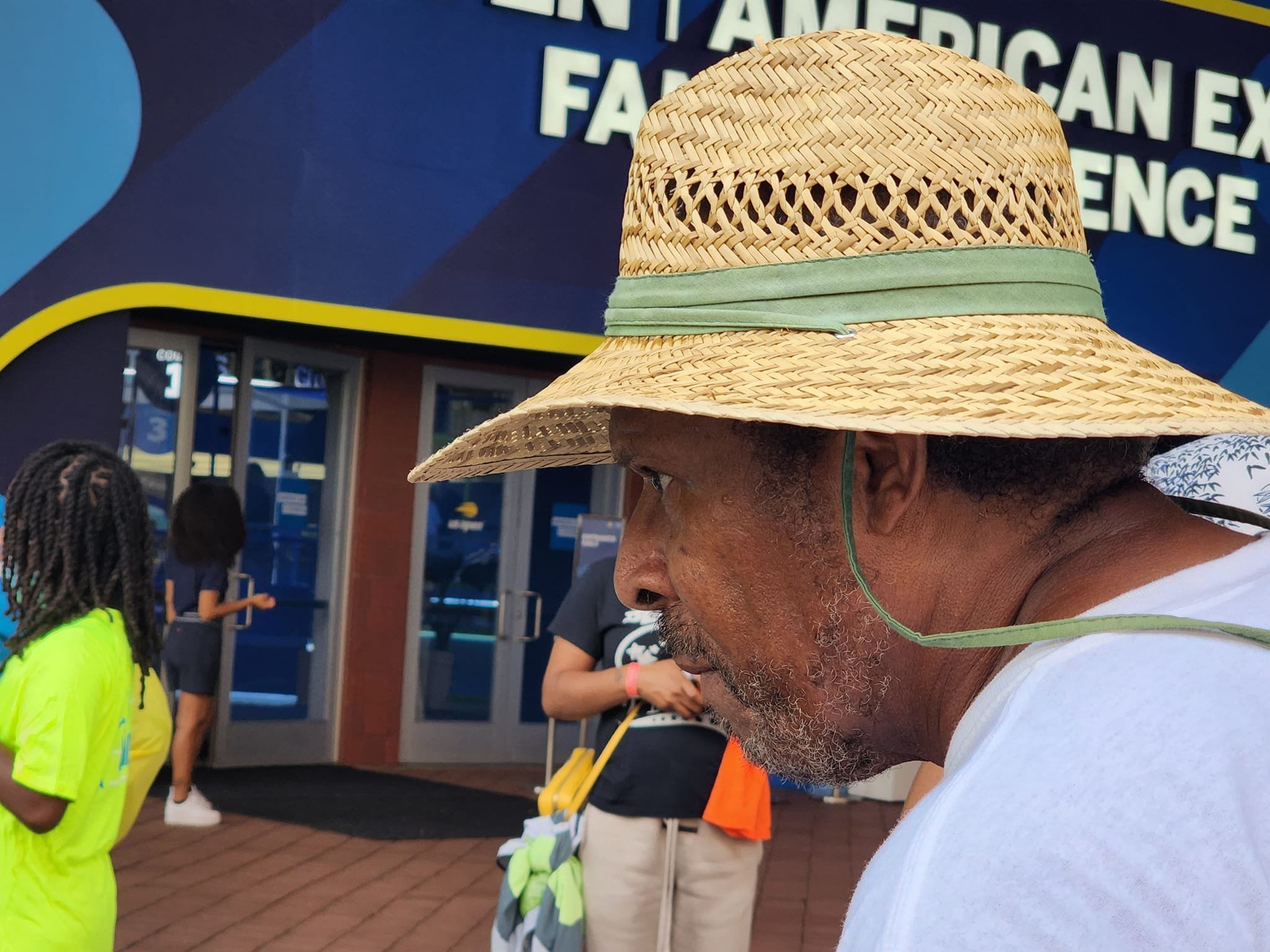 Coach & Official Marvin Hill guides BWSF youth and chaperones on a tour of US Open Exhibits and Attractions.jpg