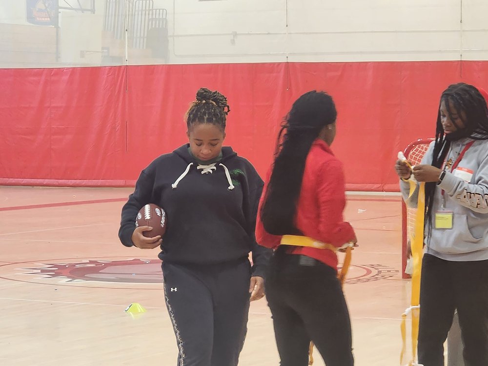 Marirose Roach coaching Flag Football break out session.jpg