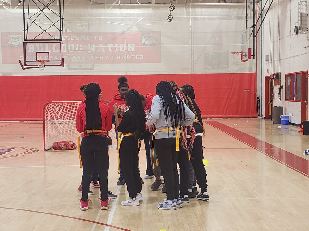 flag football huddle.jpg