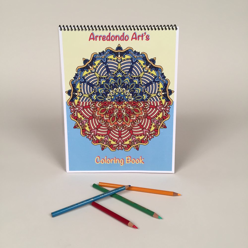  a coloring book based on mandalas that the student had created by hand on the computer and then printed out and spiral bound. this book had about 25 images to color (holy cow!). 