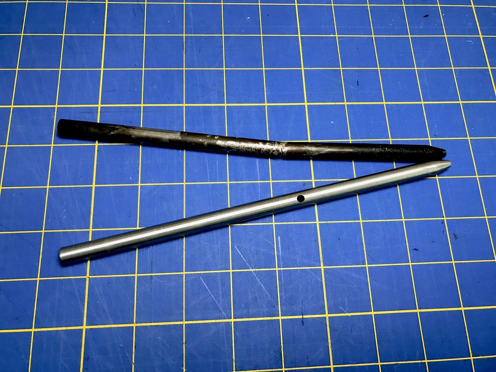  a comparison of the old bent rod and the new rod. 