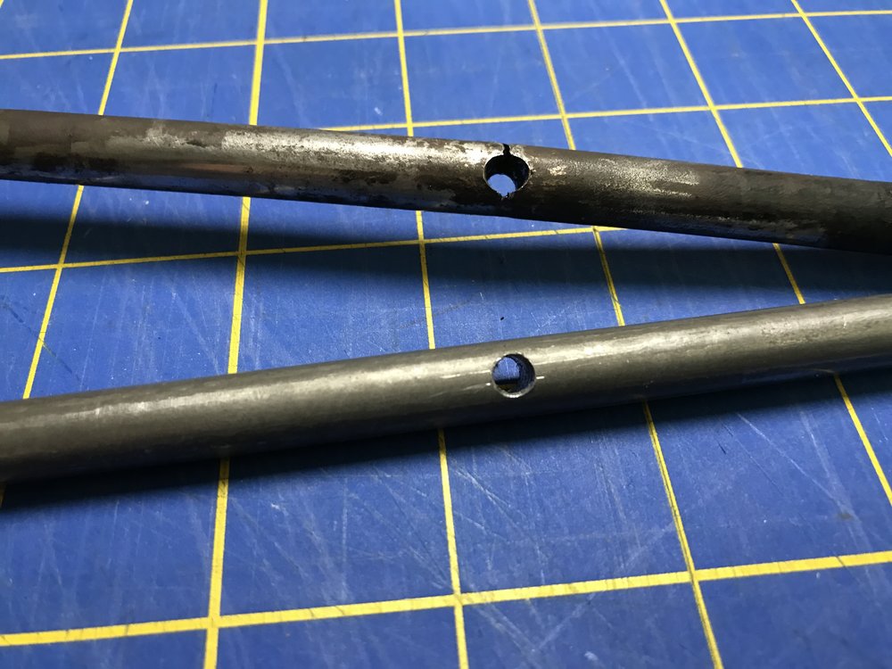  a closeup of the broken yoke spring rod next to the new rod that I made. 