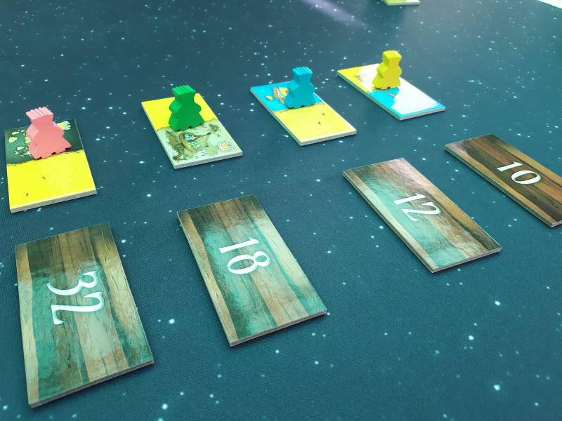 Yellow will go first but not before we flip over the new tiles.
