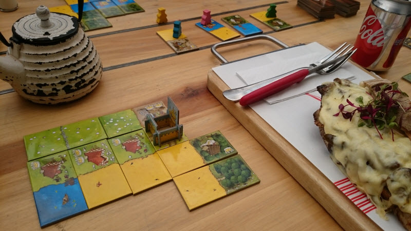 Despite the small box the footprint is actually quite large. So it's not really that good at a restaurant but once you get to know it you can finish your game before your food arrives.