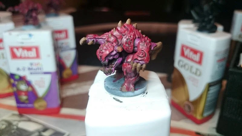 The highlights are painted where light would fall, on the higher areas of the model. It makes the details pop out.
