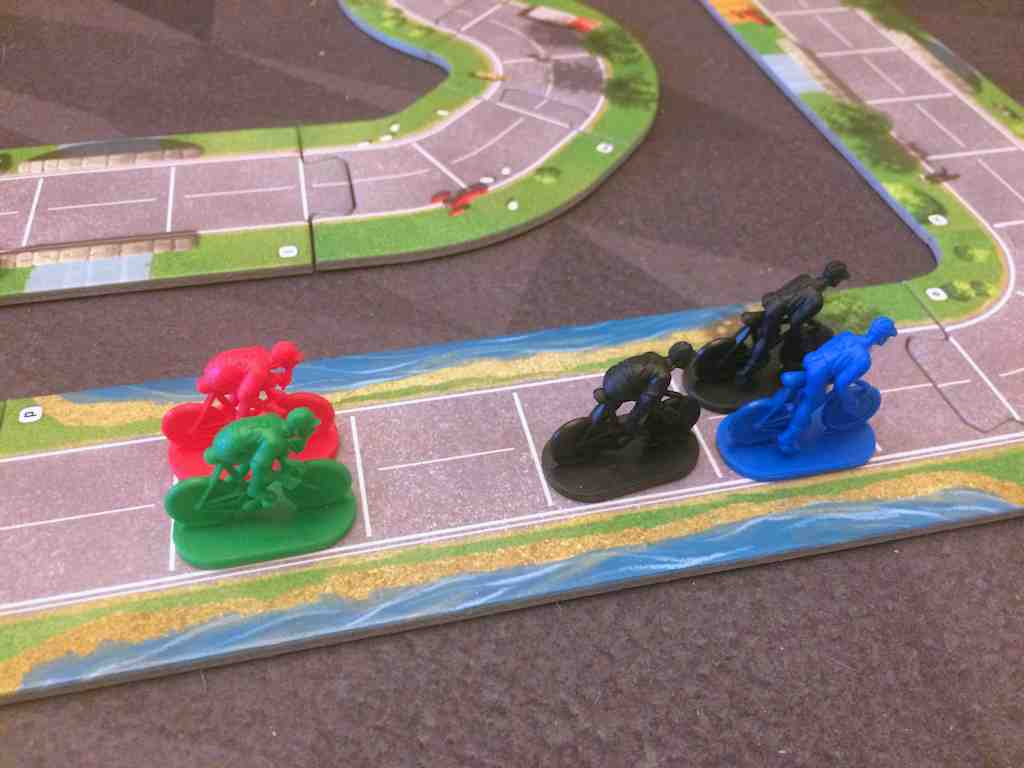 Red and green riders are going to get pulled in by the slipstream.