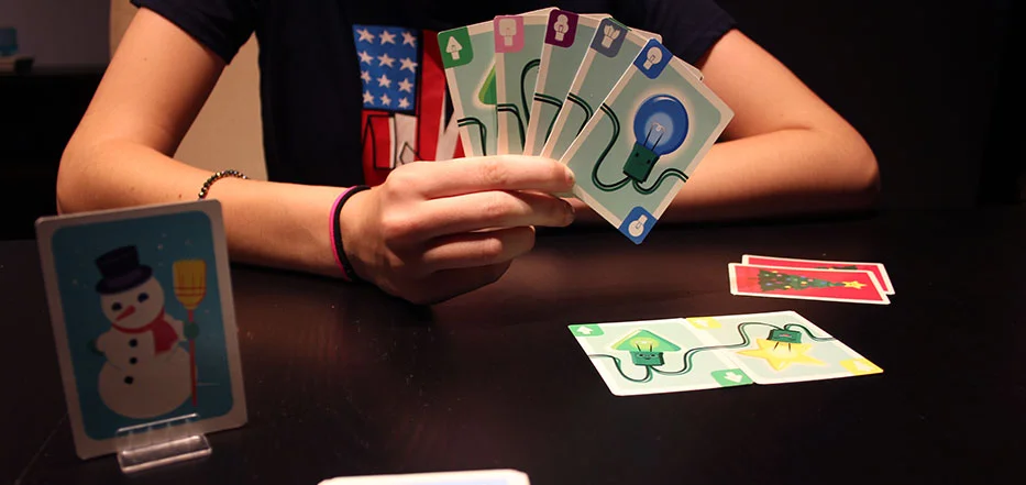 christmas-lights-player-hand.jpg