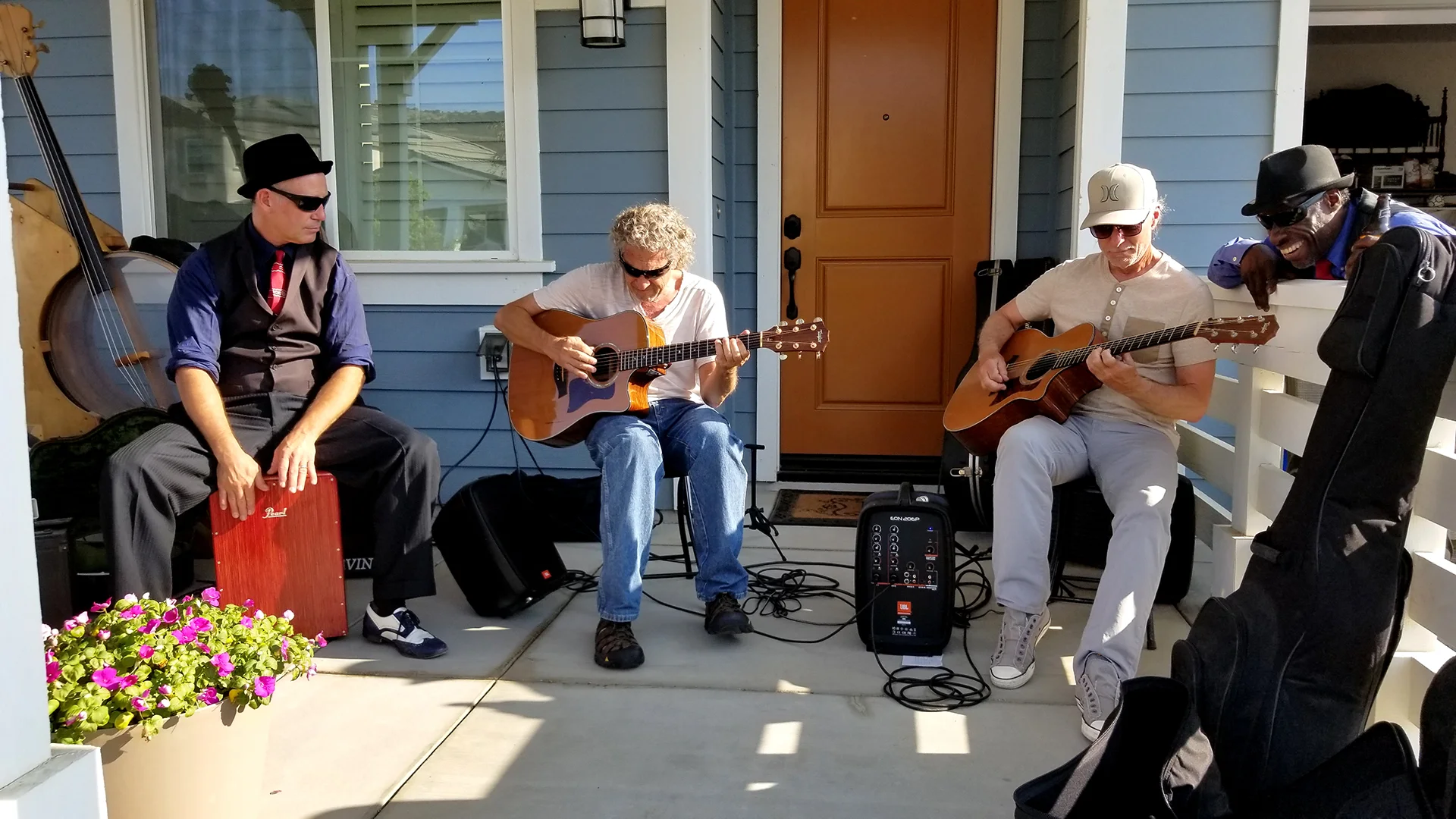 (l-r) Todd Szabo, Curt Brock, David Storrs, and Kingfish enjoying themselves and the music.