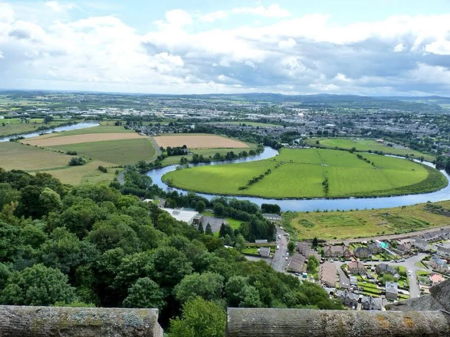 From the viewing platform in the crown atop the Wallace Monument you can clearly see the battlefield. Here, looking south, as Wallace did, the English army was on the opposite side of the River Forth. To reach Wallace's men they crossed a narrow bridge only to be trapped in the fields on the left formed by the loop of the river. Photo courtesy www.adventuresaroundscotland.com