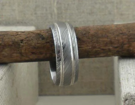 Damascus Steel Wedding Ring with Sterling Silver Milgrain by Lashbrook Designs