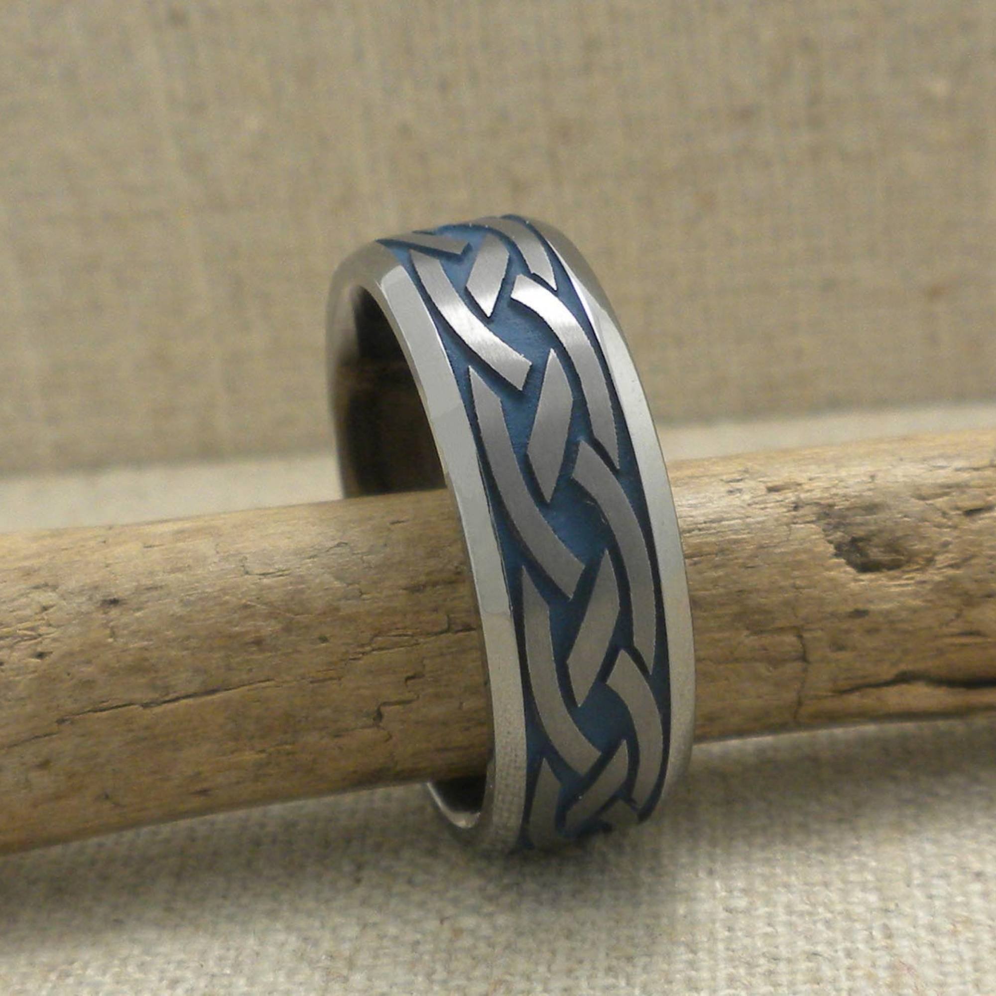 Celtic Knot Wedding Ring in Tantalum Sky Blue Background