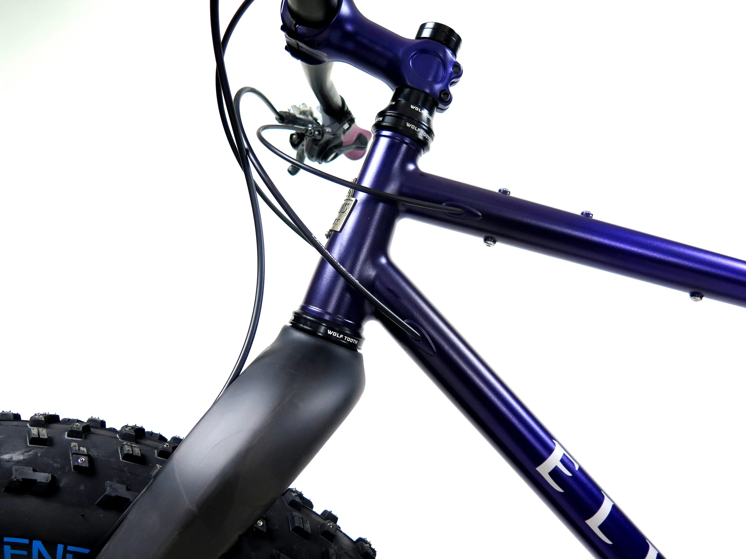  A shot of the internal routing for the rear brake and rear derailleur along with a good view of the extra braze ons on the top tube for bag mounts.  