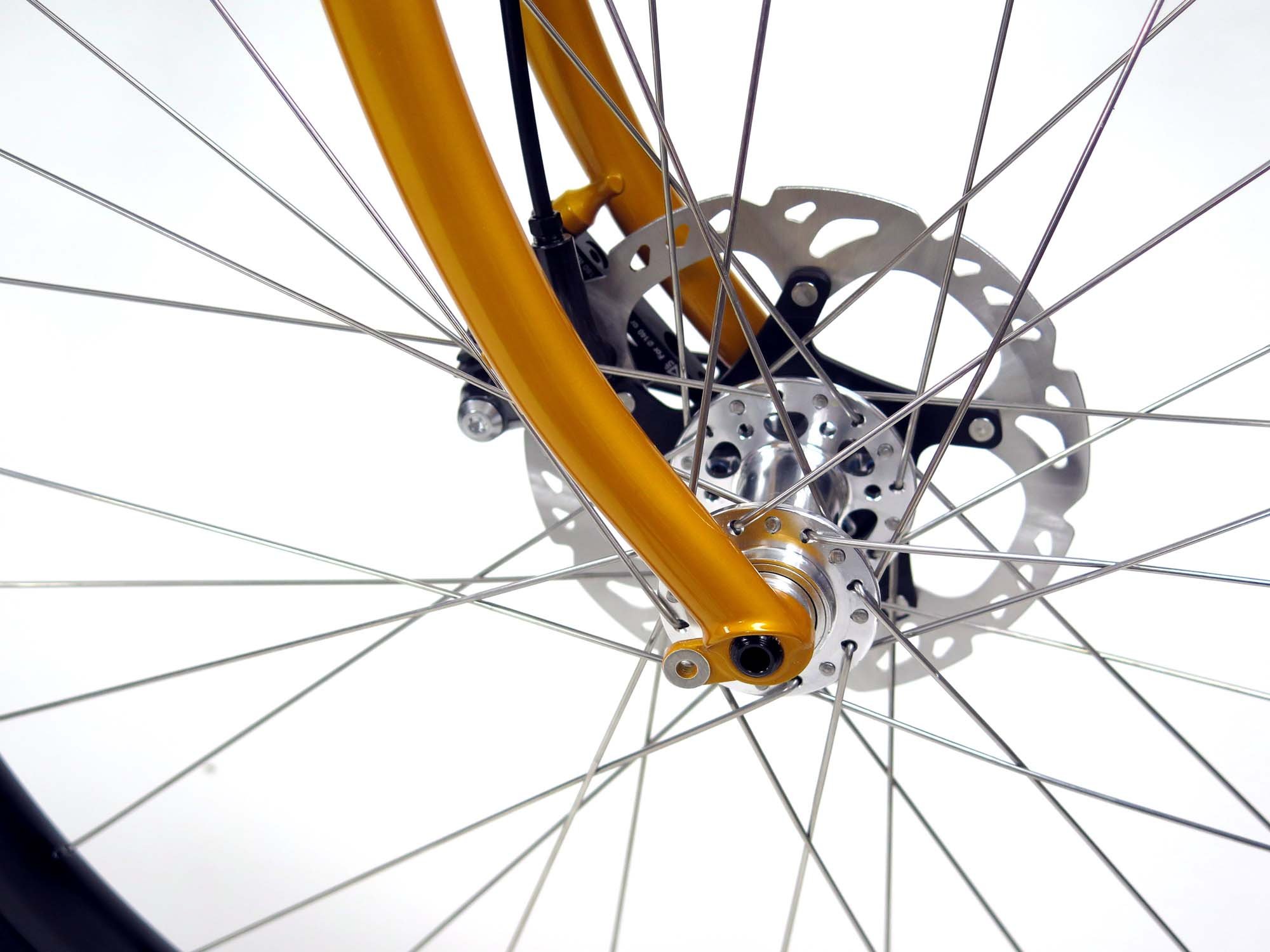  My custom flat mount, thru-axle fork keeps the front end solid.  Fender mounts added too if Ryan ever wants to run some skinnier tires and fenders.   